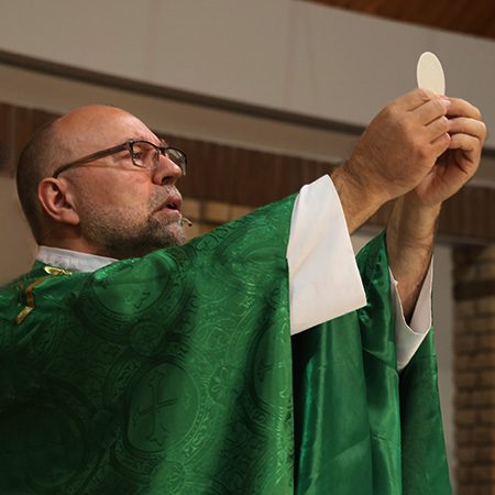 Fr. Yves at Mass